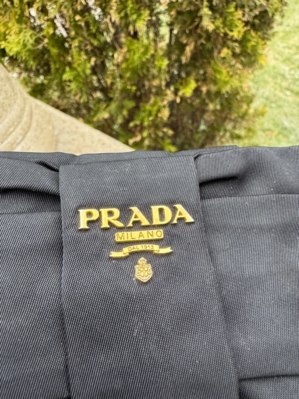 Prada Tessuto Nylon Bow Wristlet featuring a bow accent and gold tone hardware - Picture 2 of 16